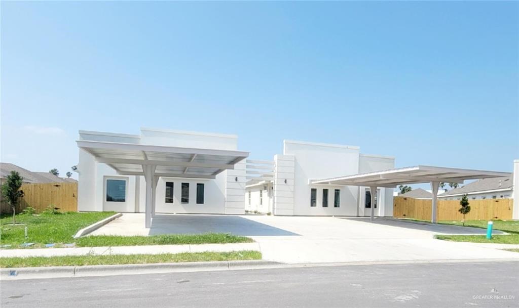 View of front of home featuring a carport