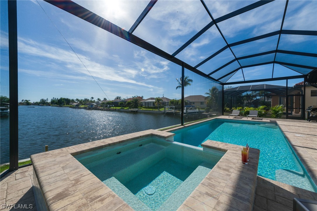 a view of a swimming pool with a patio