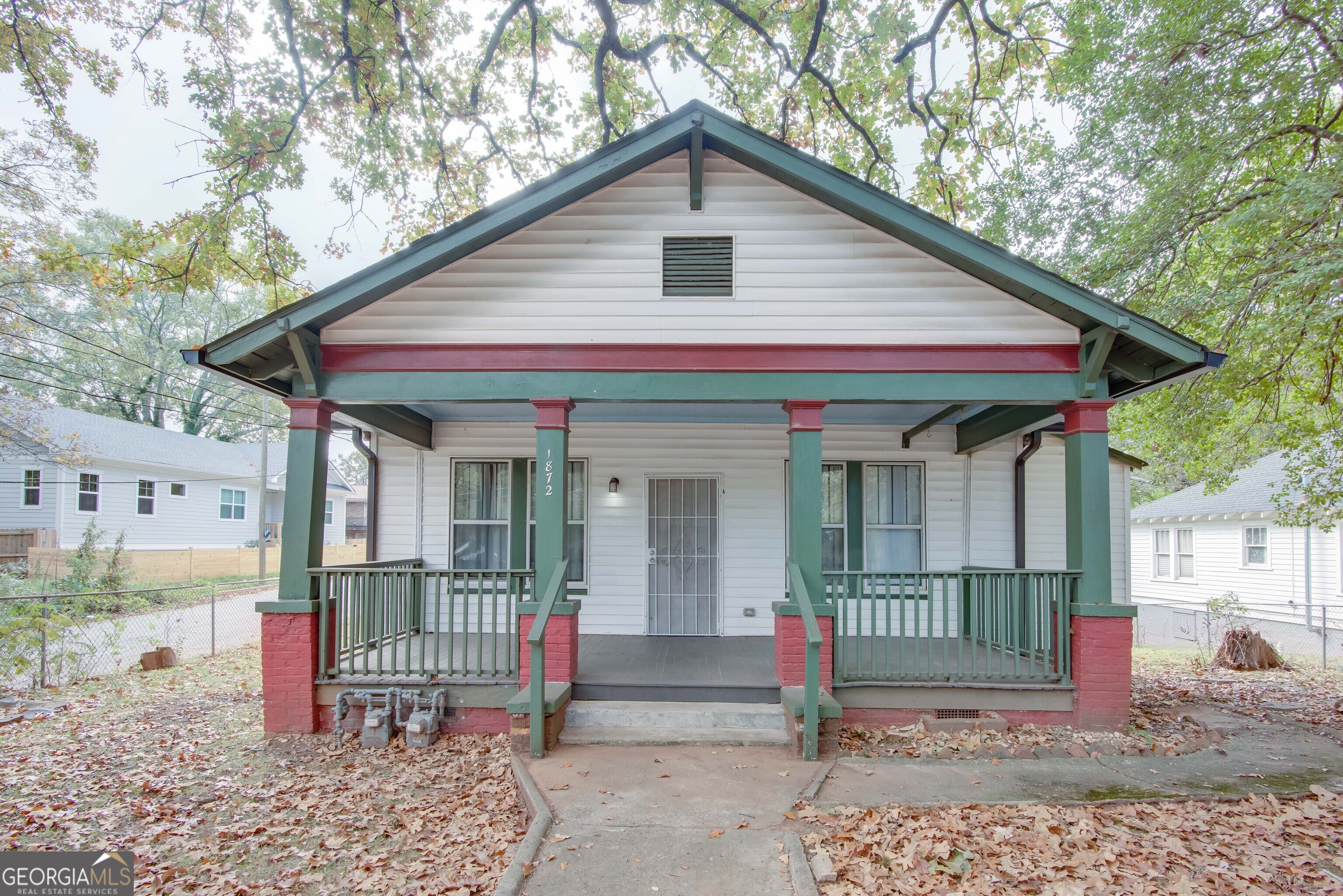 a front view of a house with a porch