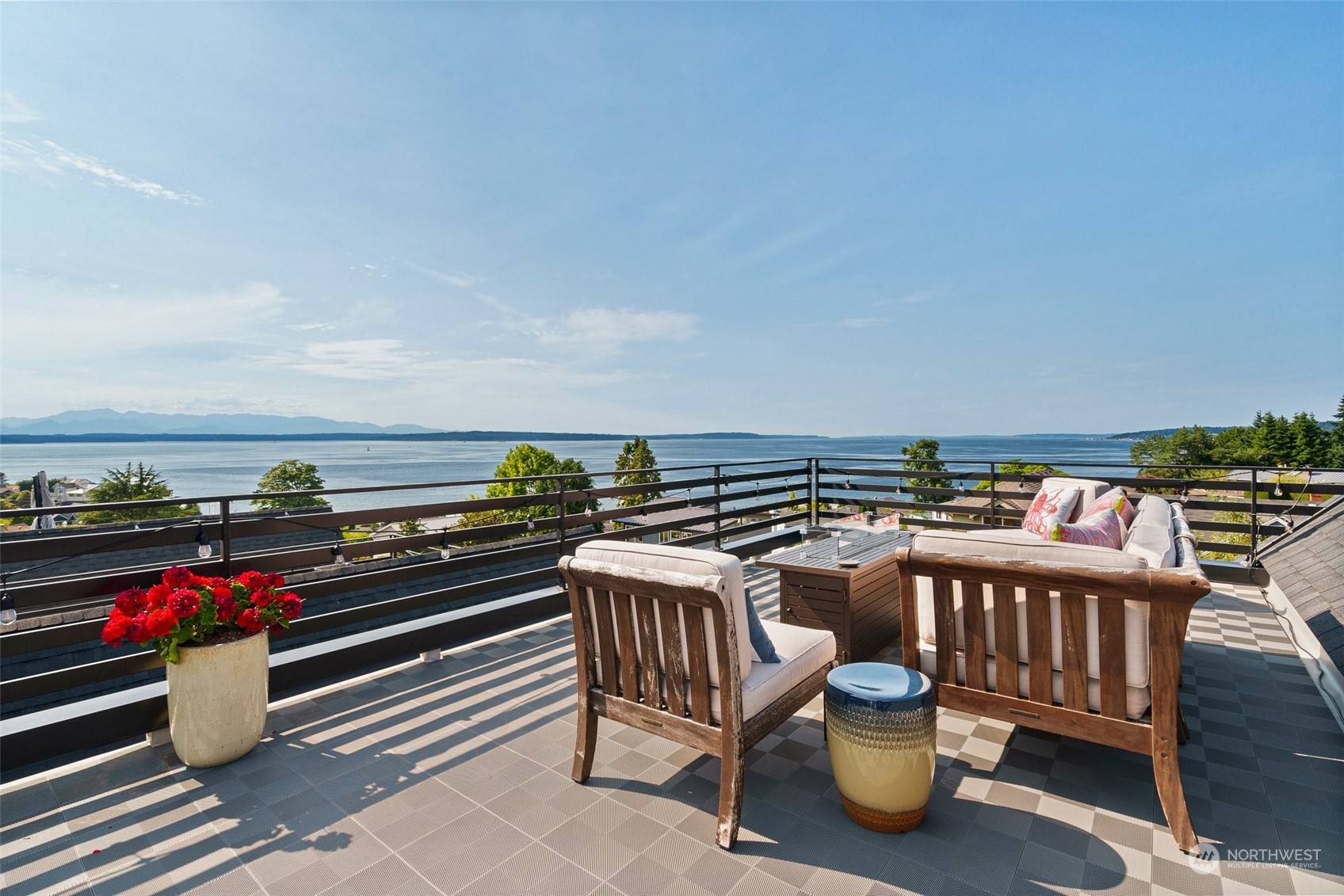 a view of a balcony with chairs