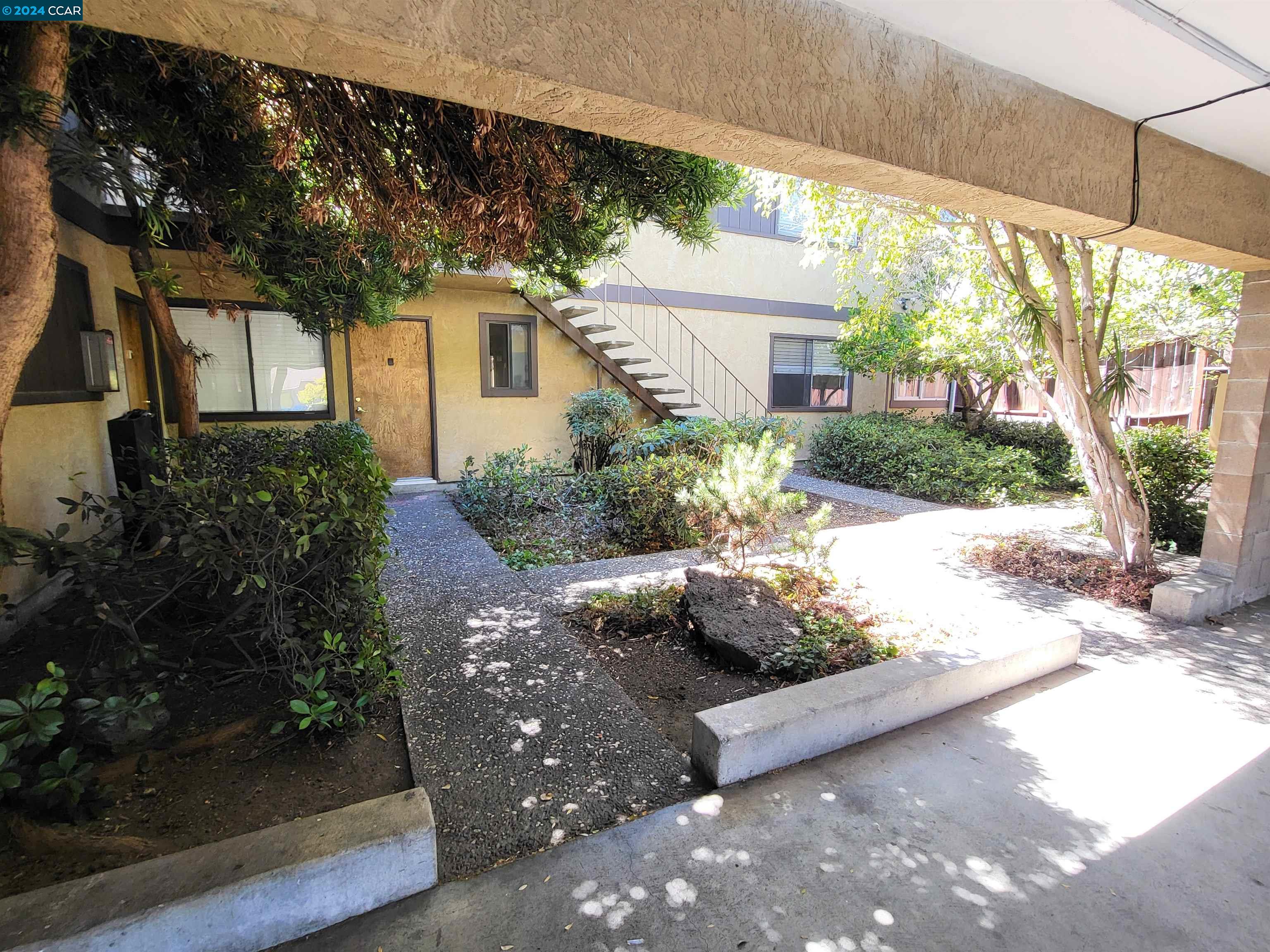 a view of a back yard of the house