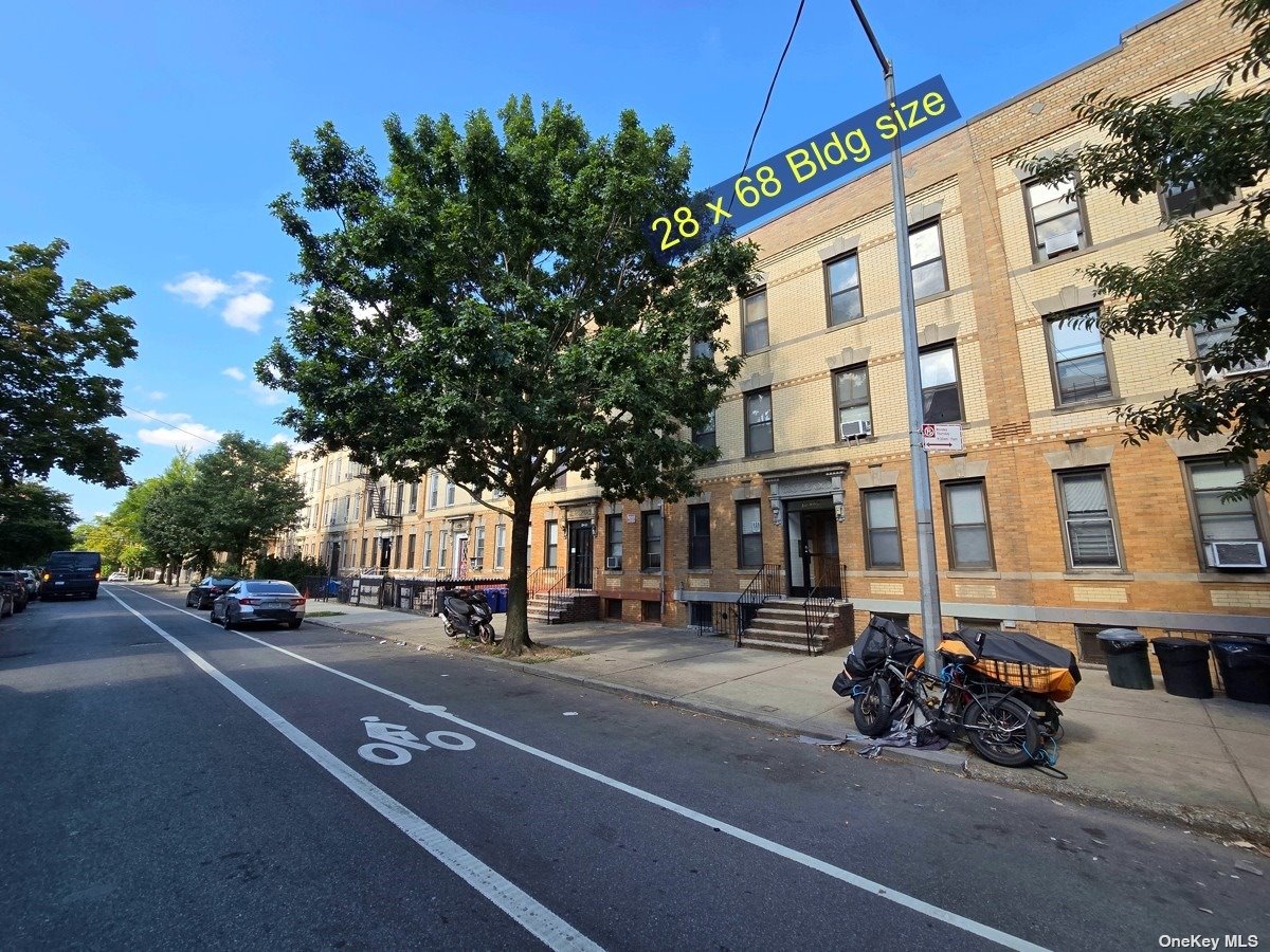 a view of a street with cars