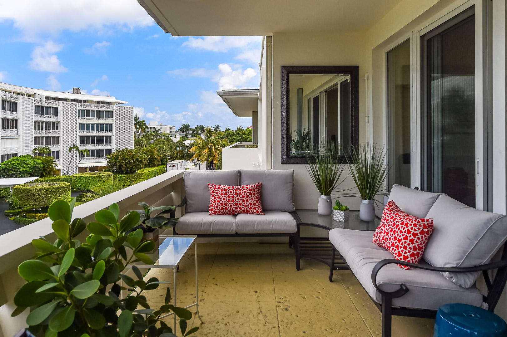 a outdoor living space with furniture and a potted plant