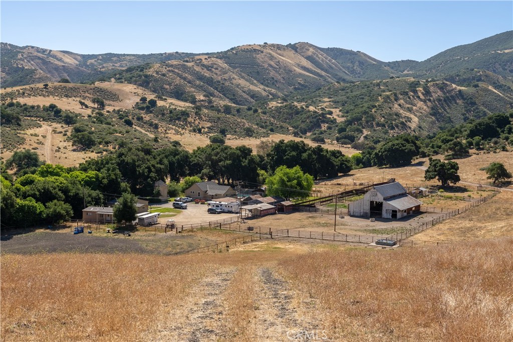 a view of a fire pit and mountain in the background