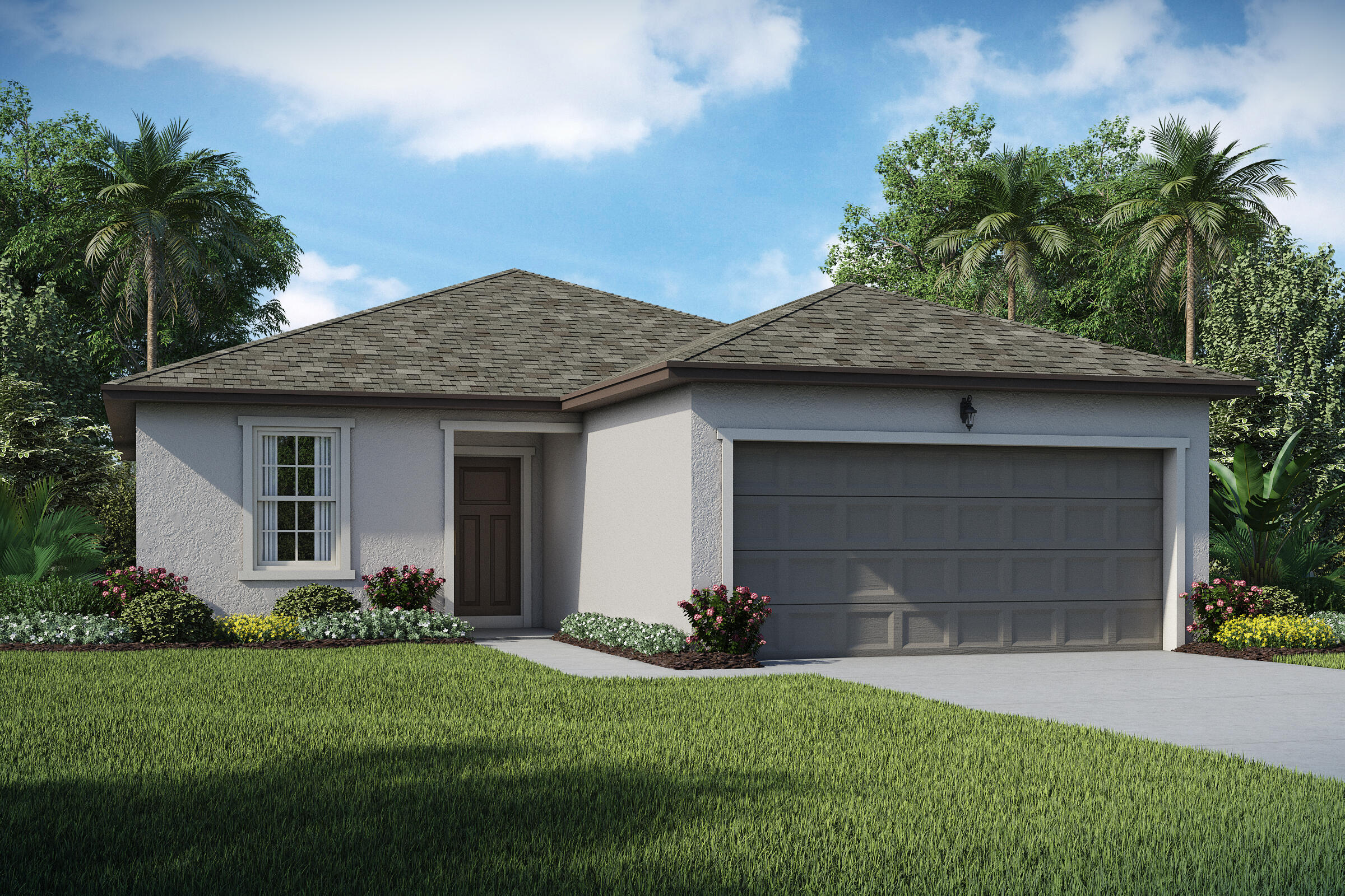 a front view of a house with a garden and garage