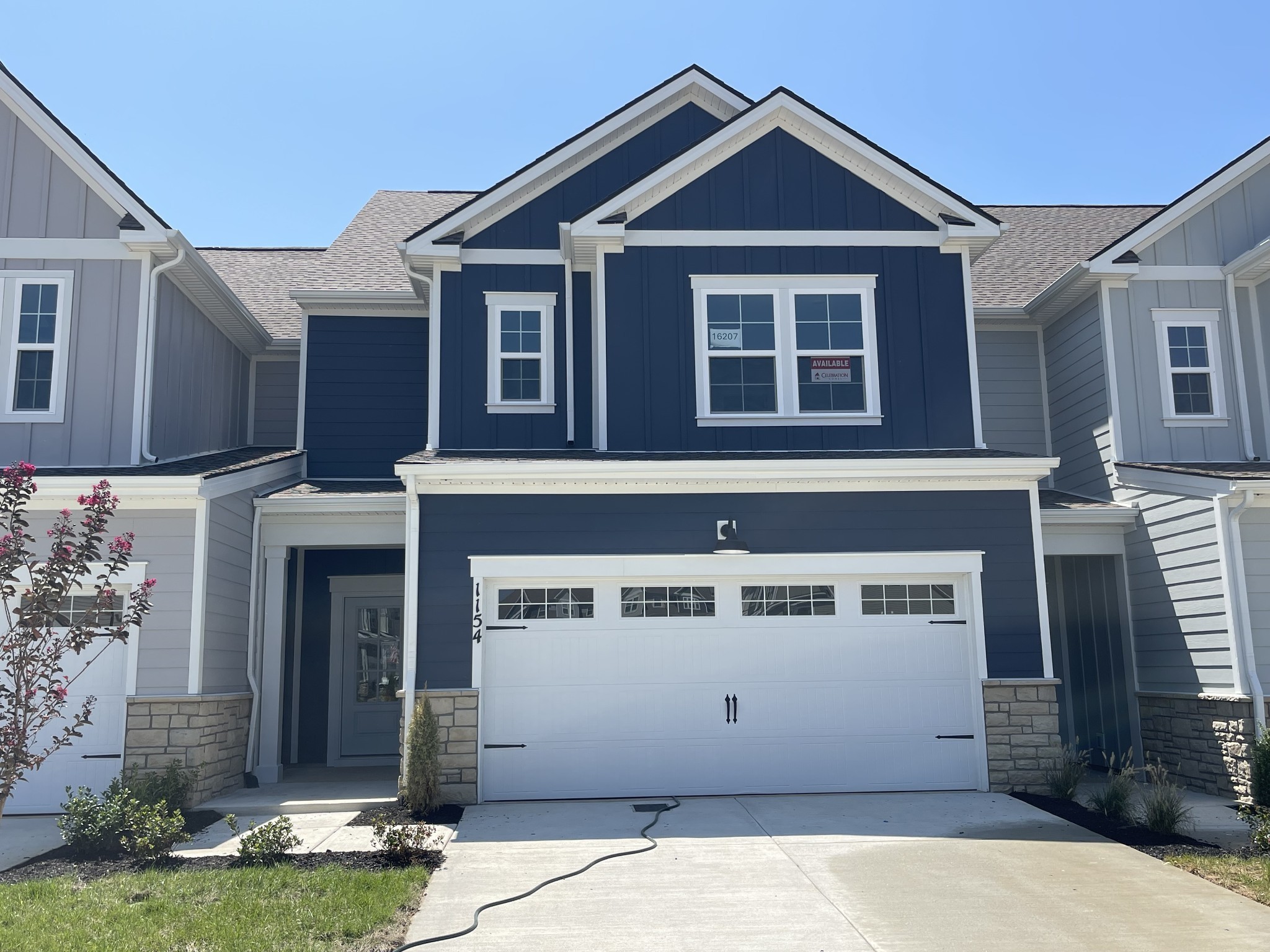 a view of a house with garage