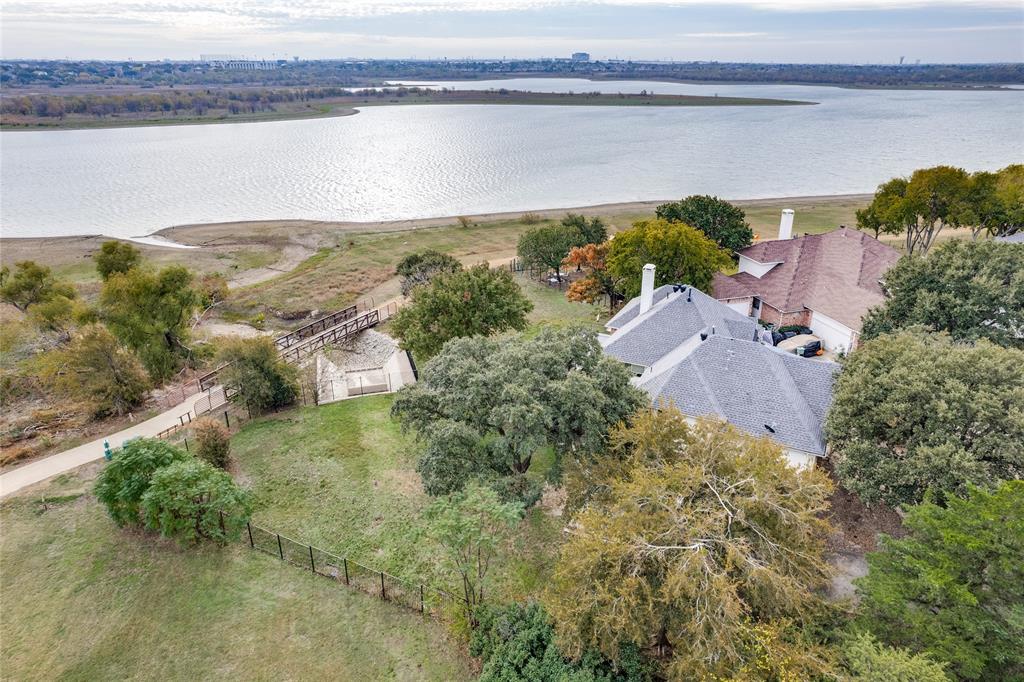 an aerial view of houses with yard