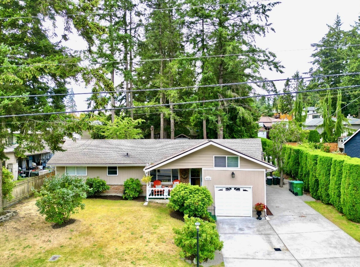 front view of a house with a yard