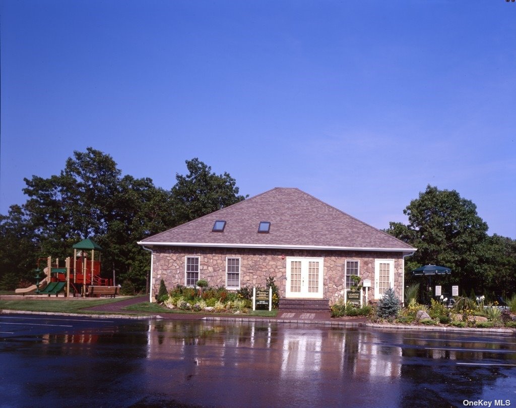 a front view of a building with garden