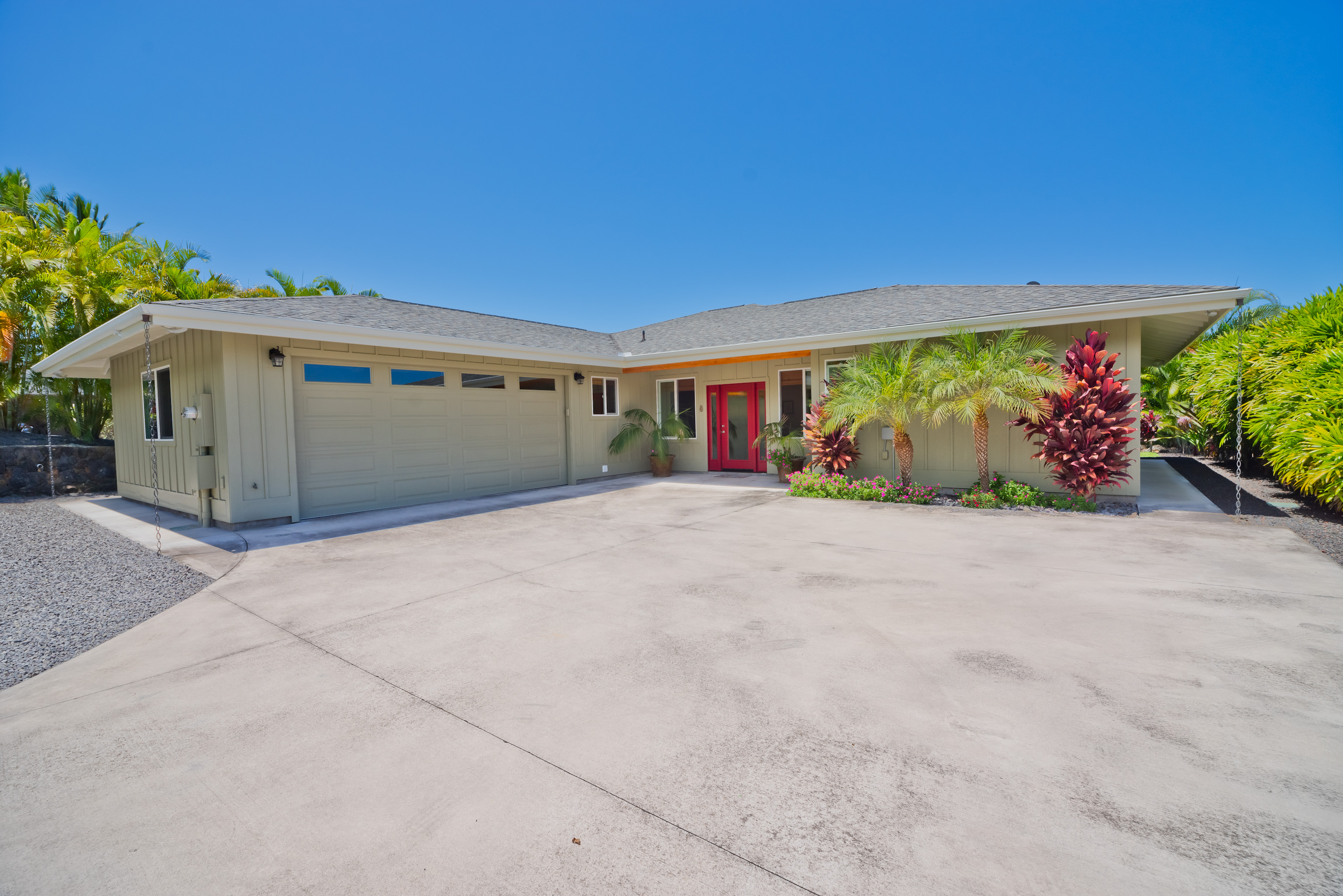 front view of a house with a yard