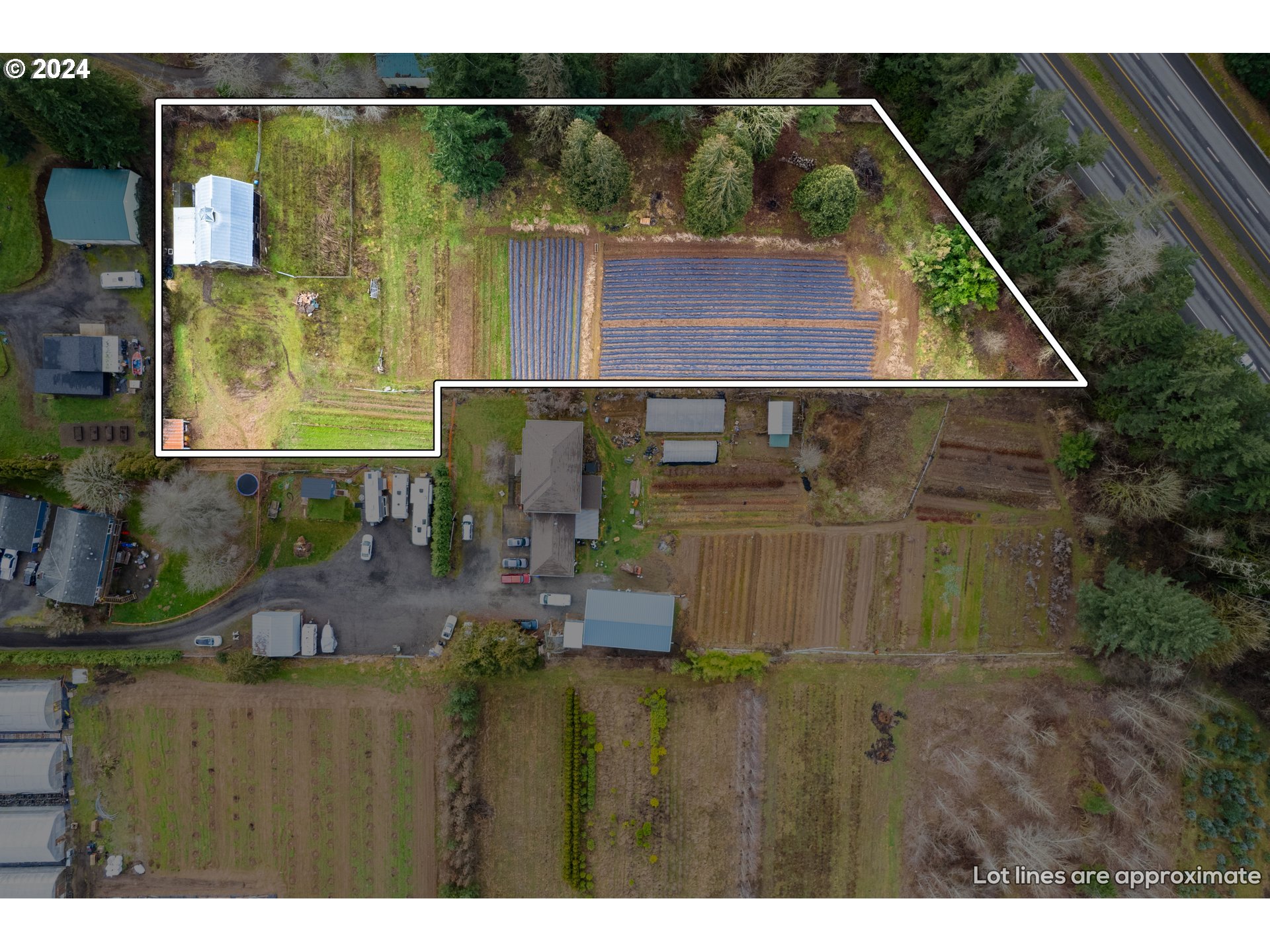 a aerial view of a house with a yard