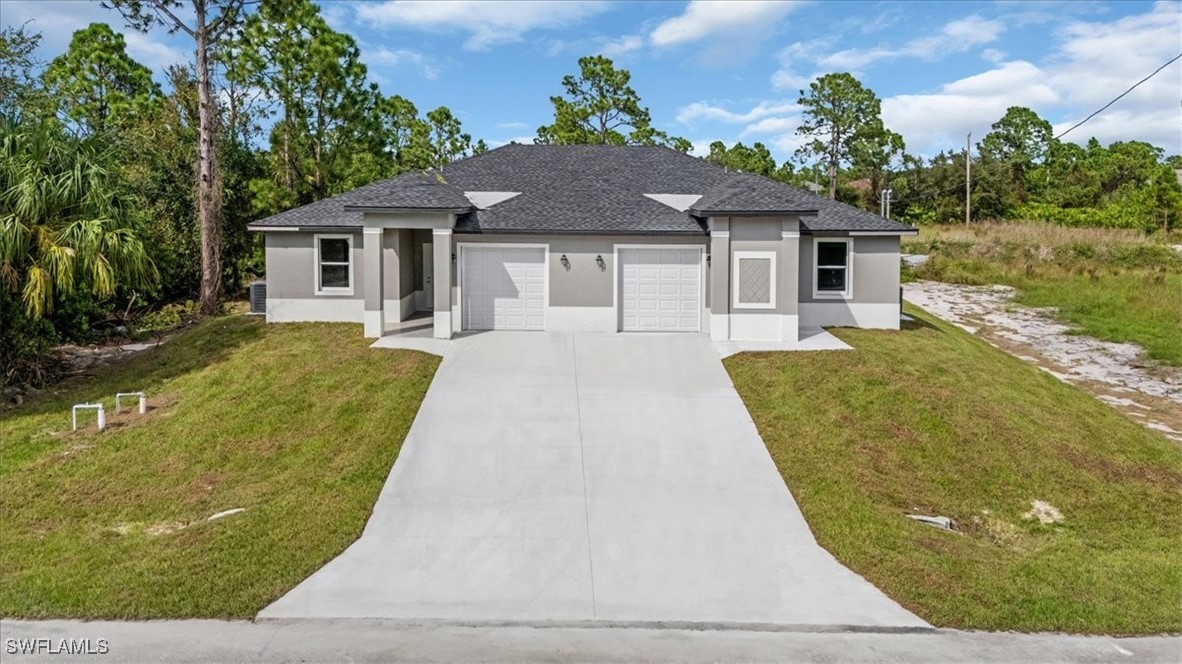 front view of a house with a yard