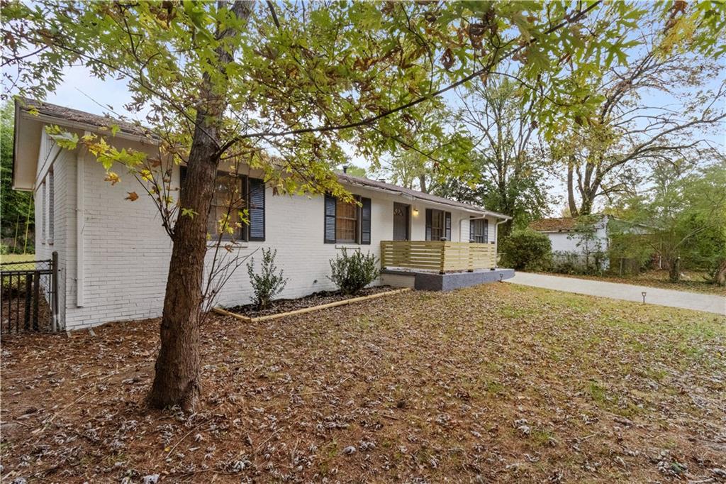 a house with trees in front of it