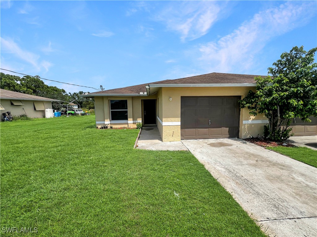 a front view of house with yard