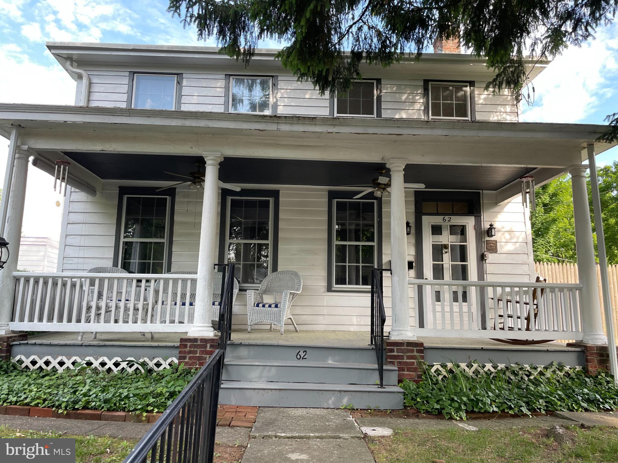 front view of a house with a small yard