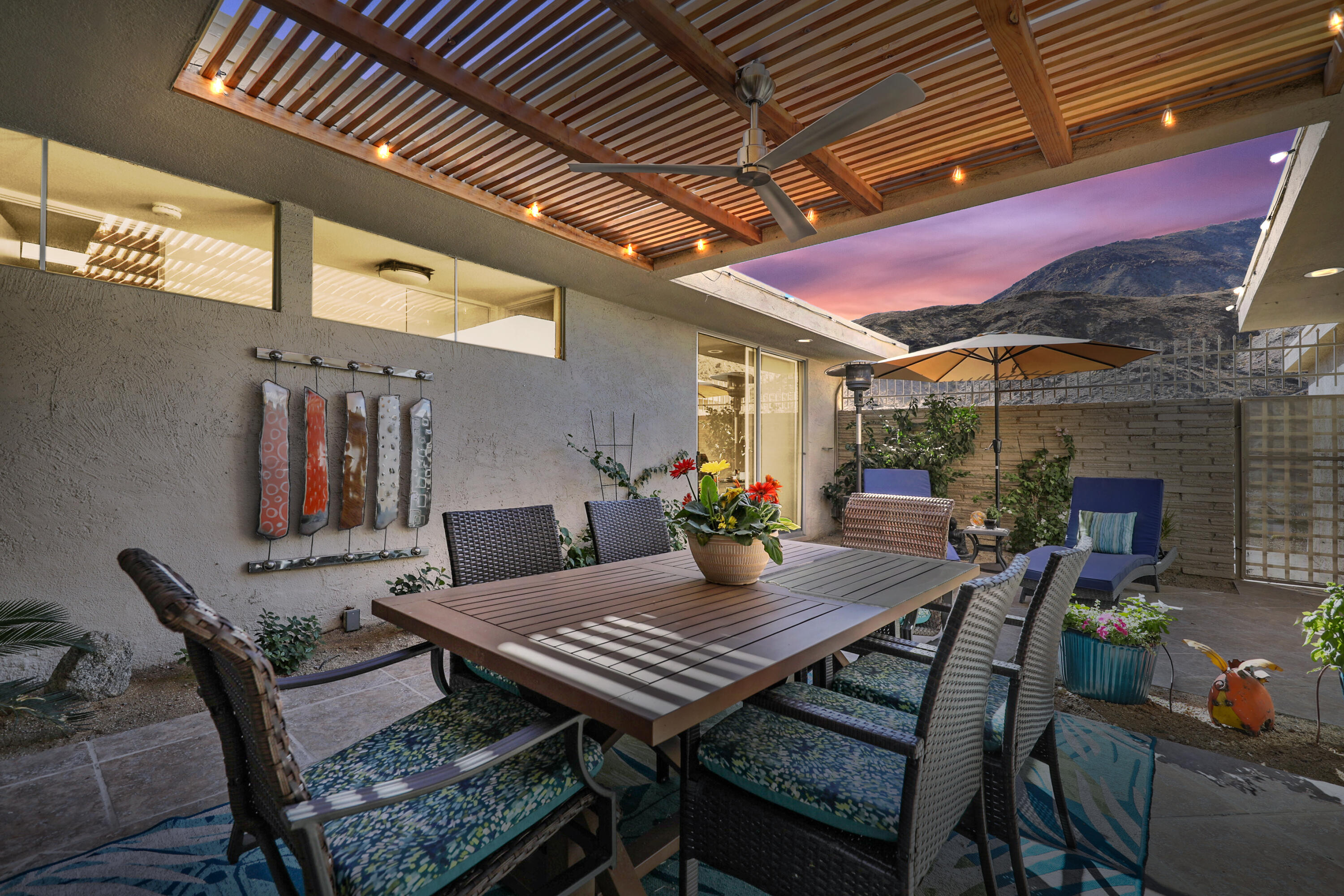 a view of a table and chairs in patio