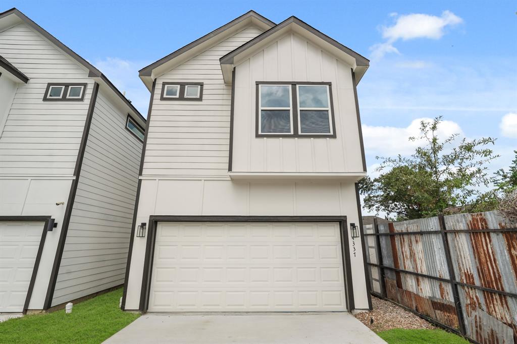 a view of a garage of the house