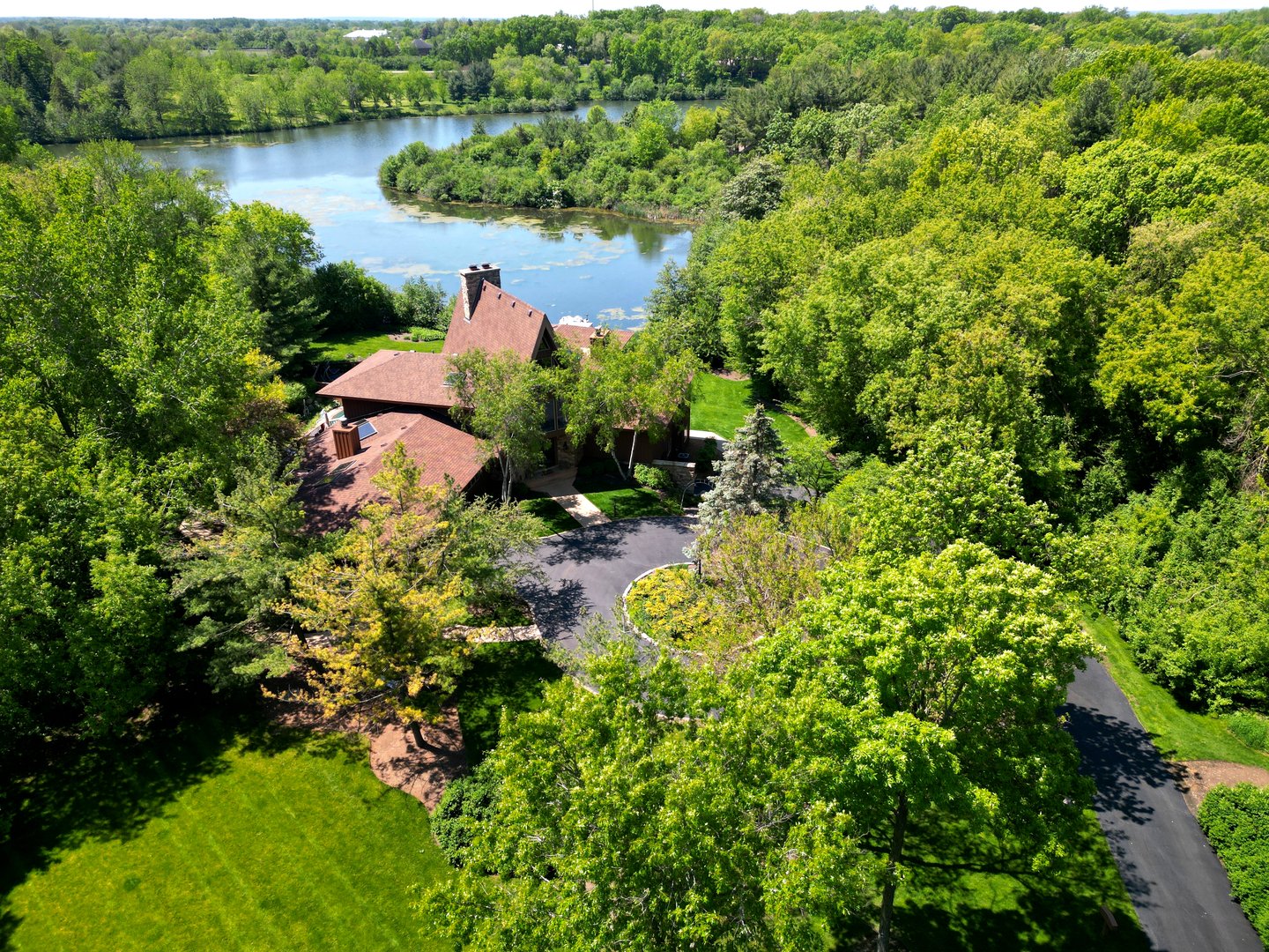 a view of a lake with a house