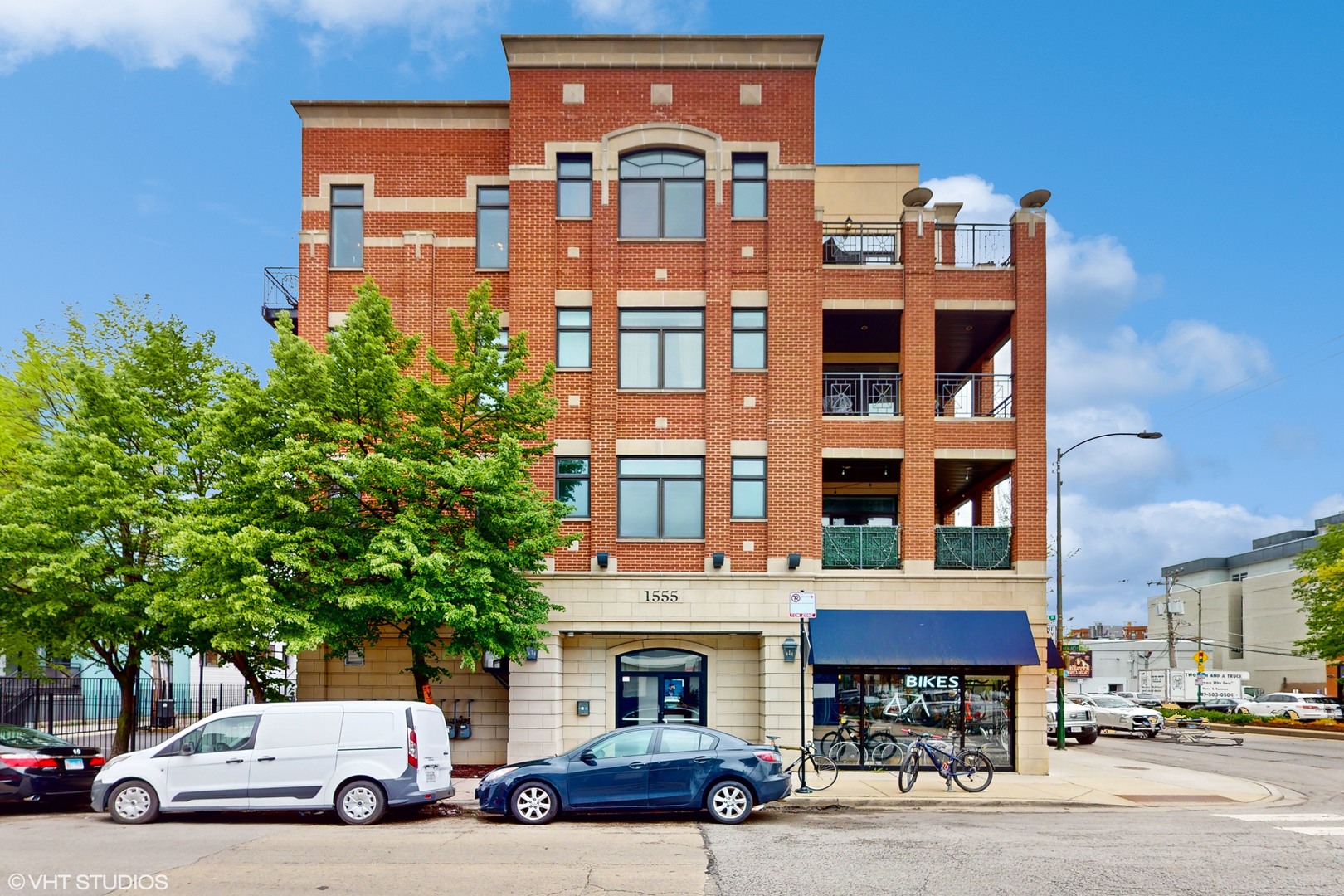 a view of a car parked in front of a building