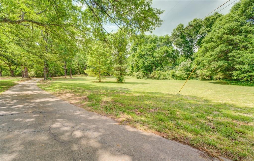 a view of a field with an outdoor space