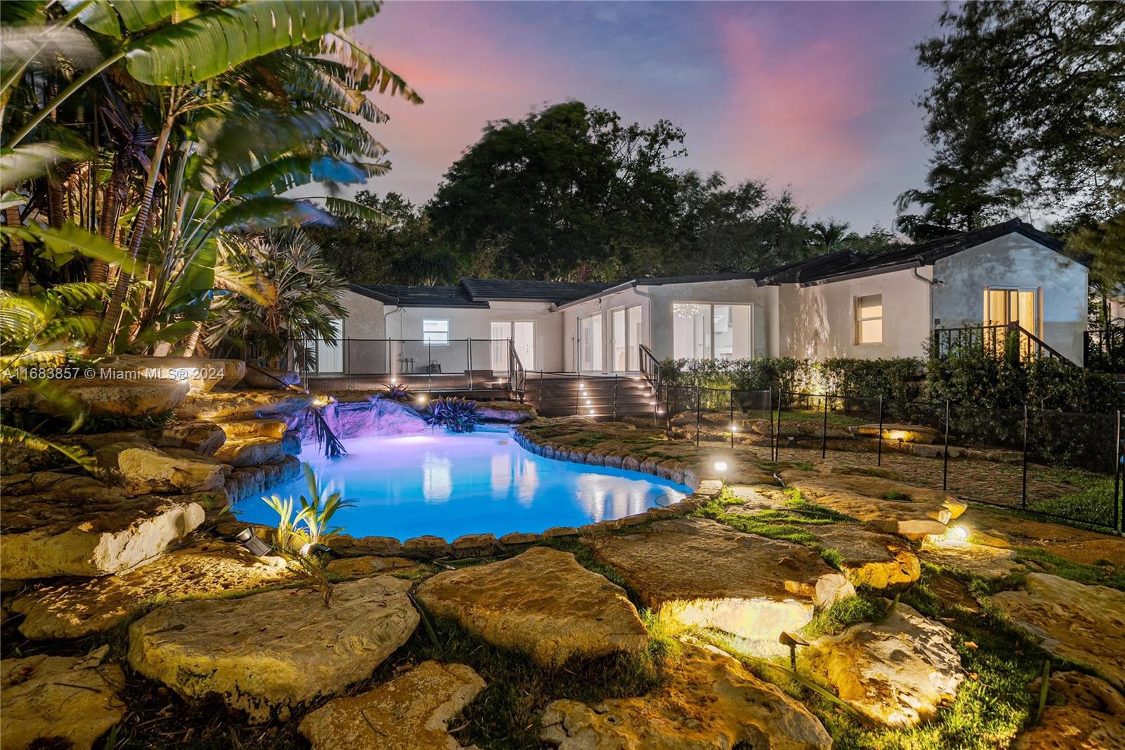 a view of a swimming pool with a patio