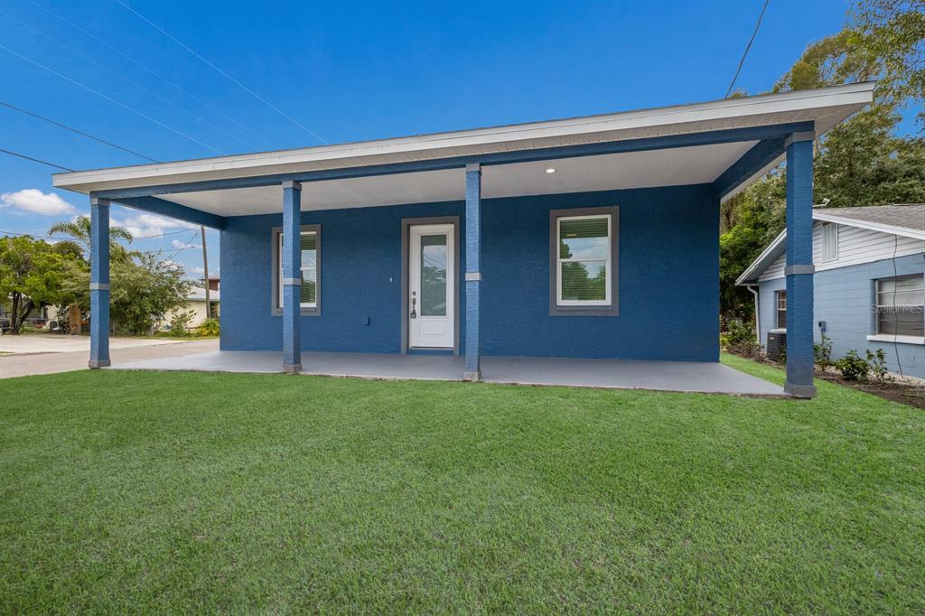 front view of a house with a yard