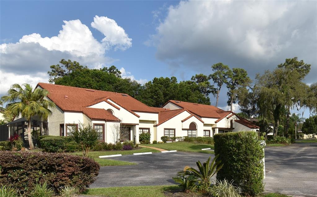 a view of house with outdoor space and street view