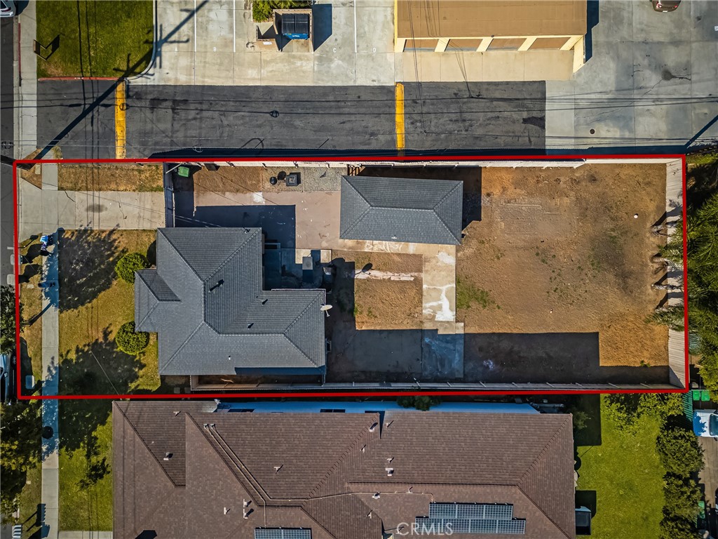 an aerial view of houses and roads