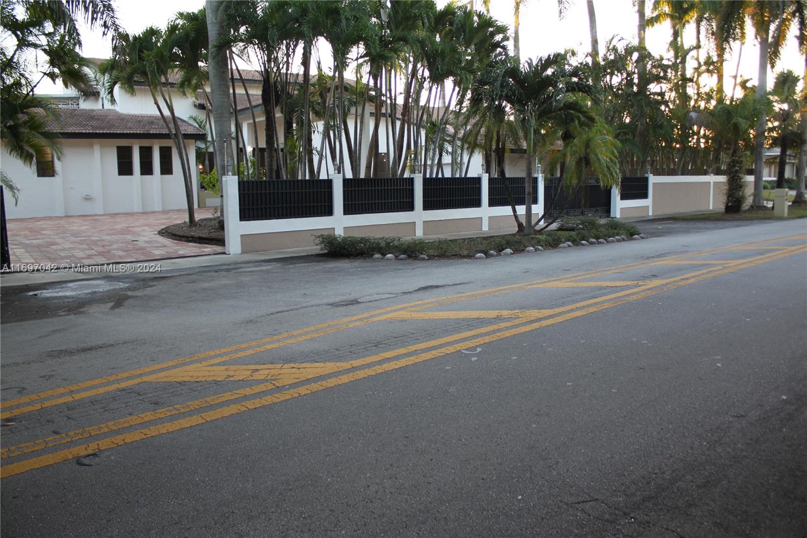 front view of a house with a street