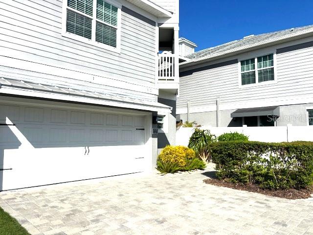 a view of a back yard of the house