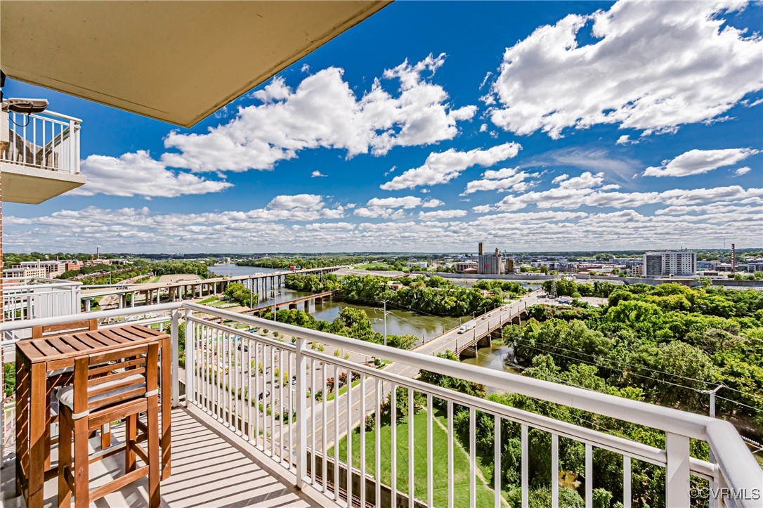 a view of a balcony with an outdoor space