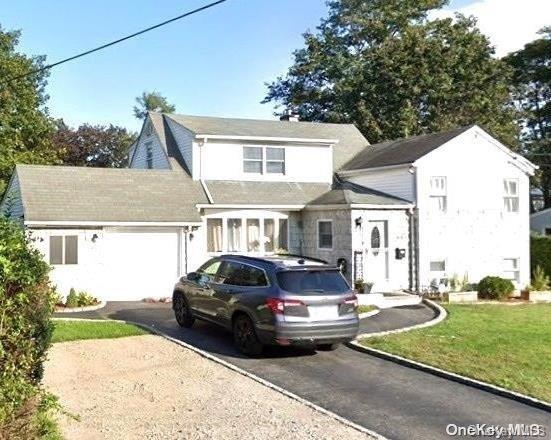 a car parked in front of a house