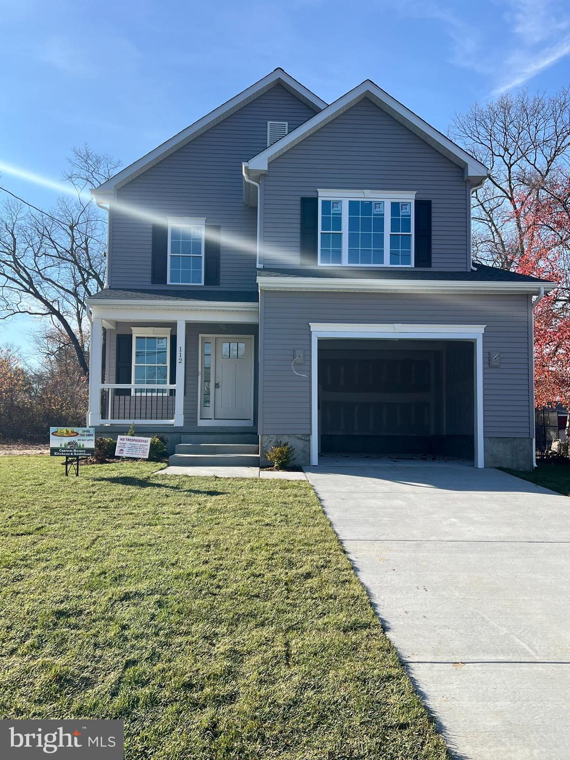 a front view of a house with yard