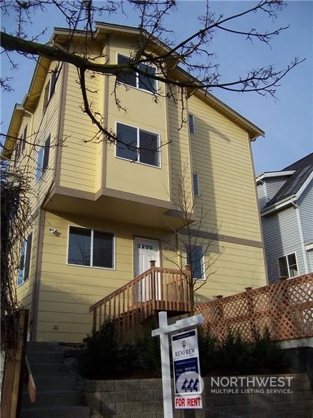 a view of a house with a street