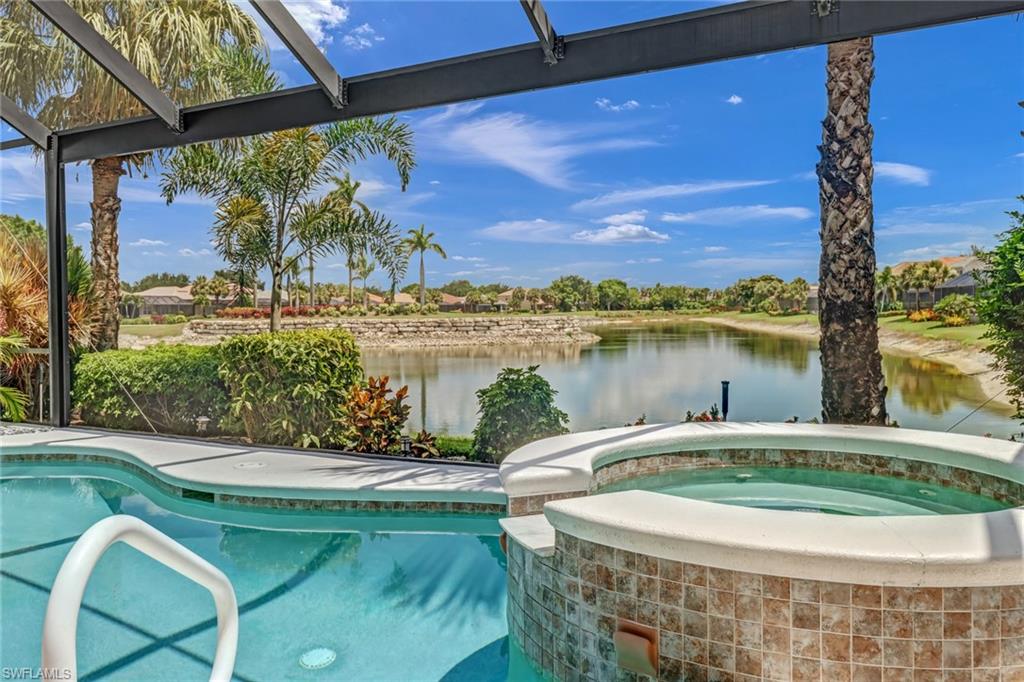 a view of a swimming pool with a patio