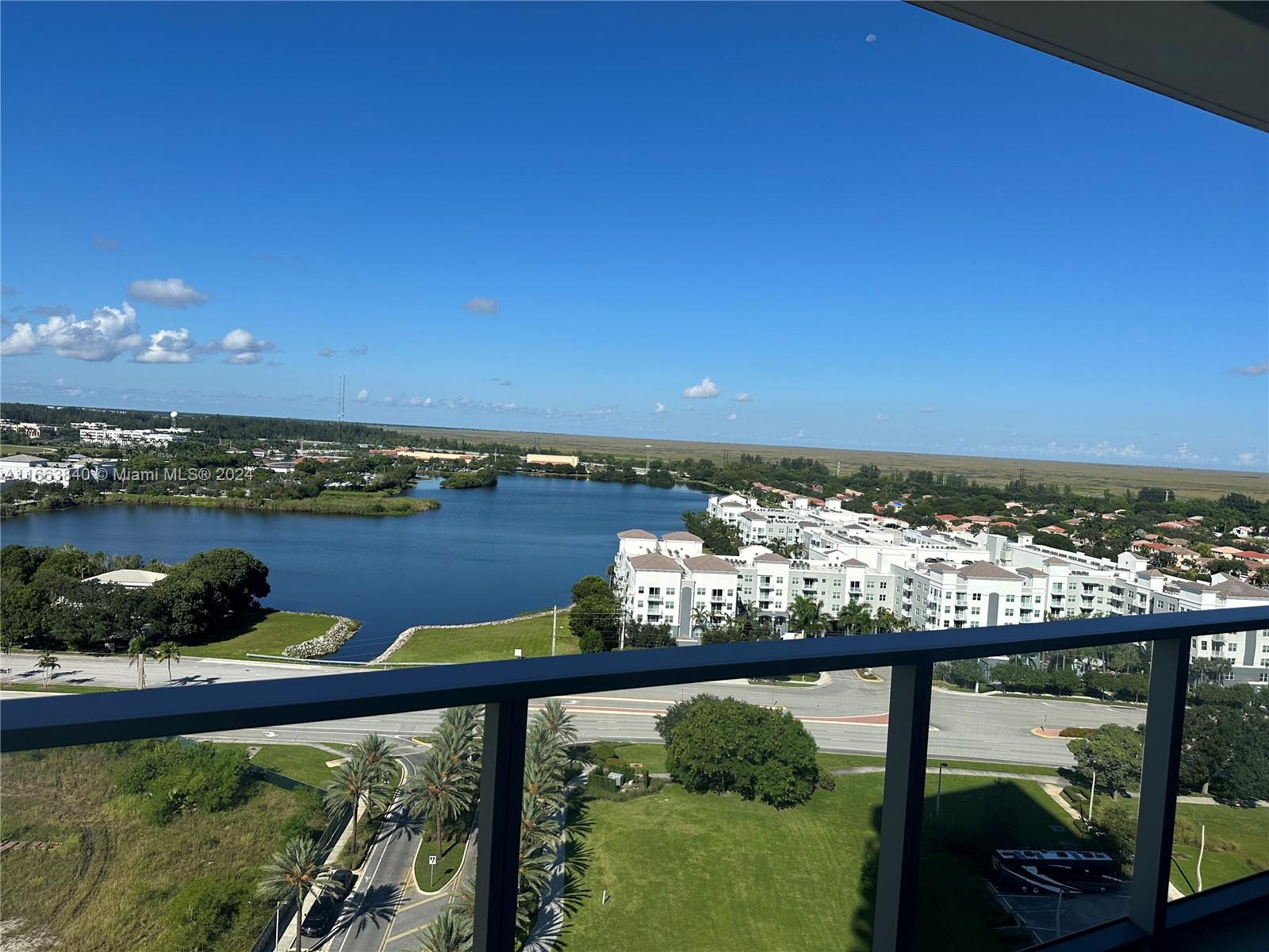 a view of a lake from a balcony