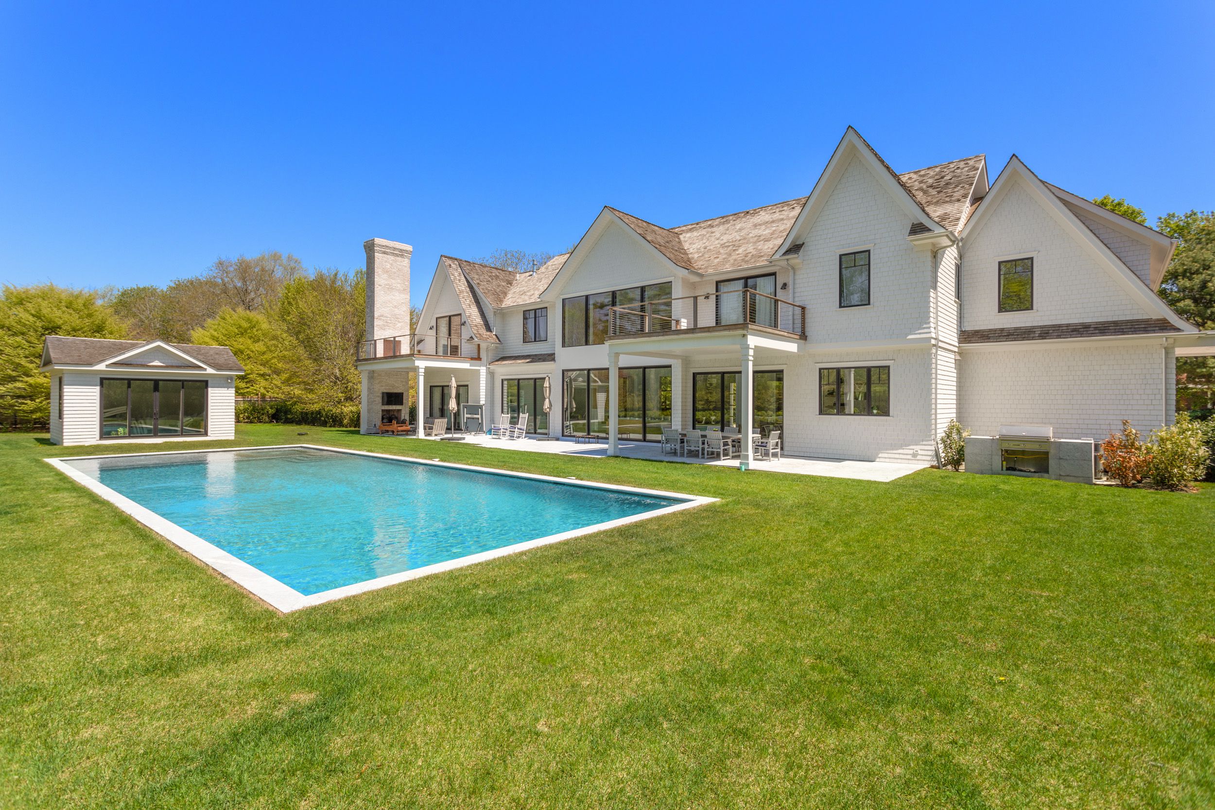 a view of a house with a swimming pool