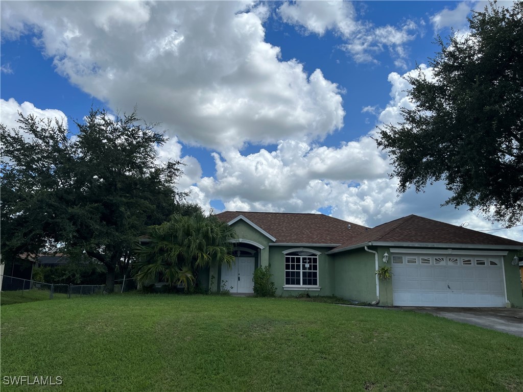 front view of house with a yard