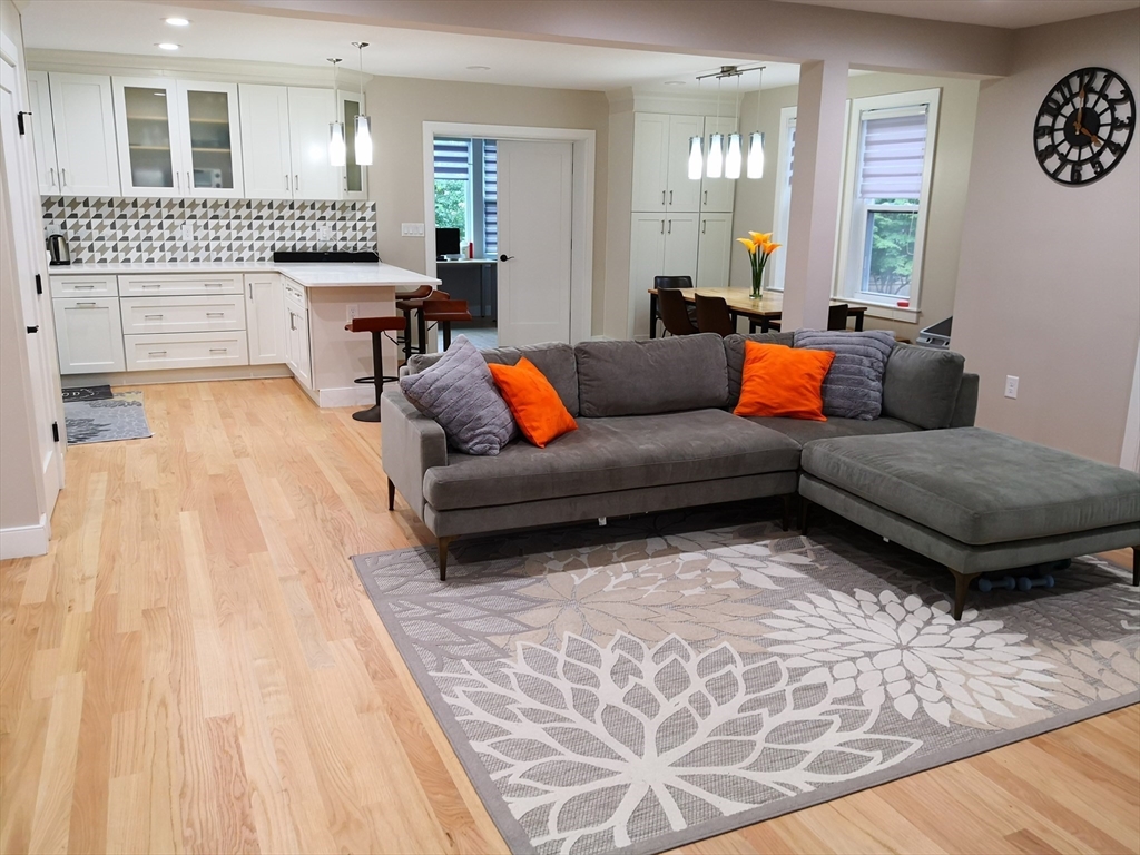 a living room with furniture and a table