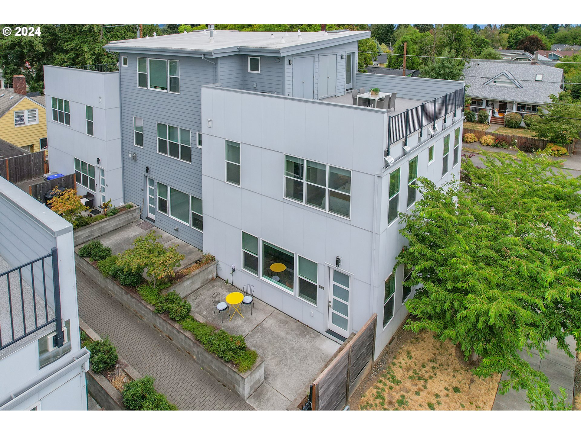 a aerial view of a house with balcony