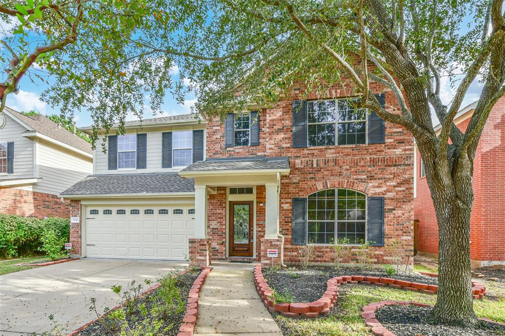 Welcome home to 5311 Barleycorn Lane in the highly sought after Seven Meadows community in Katy!