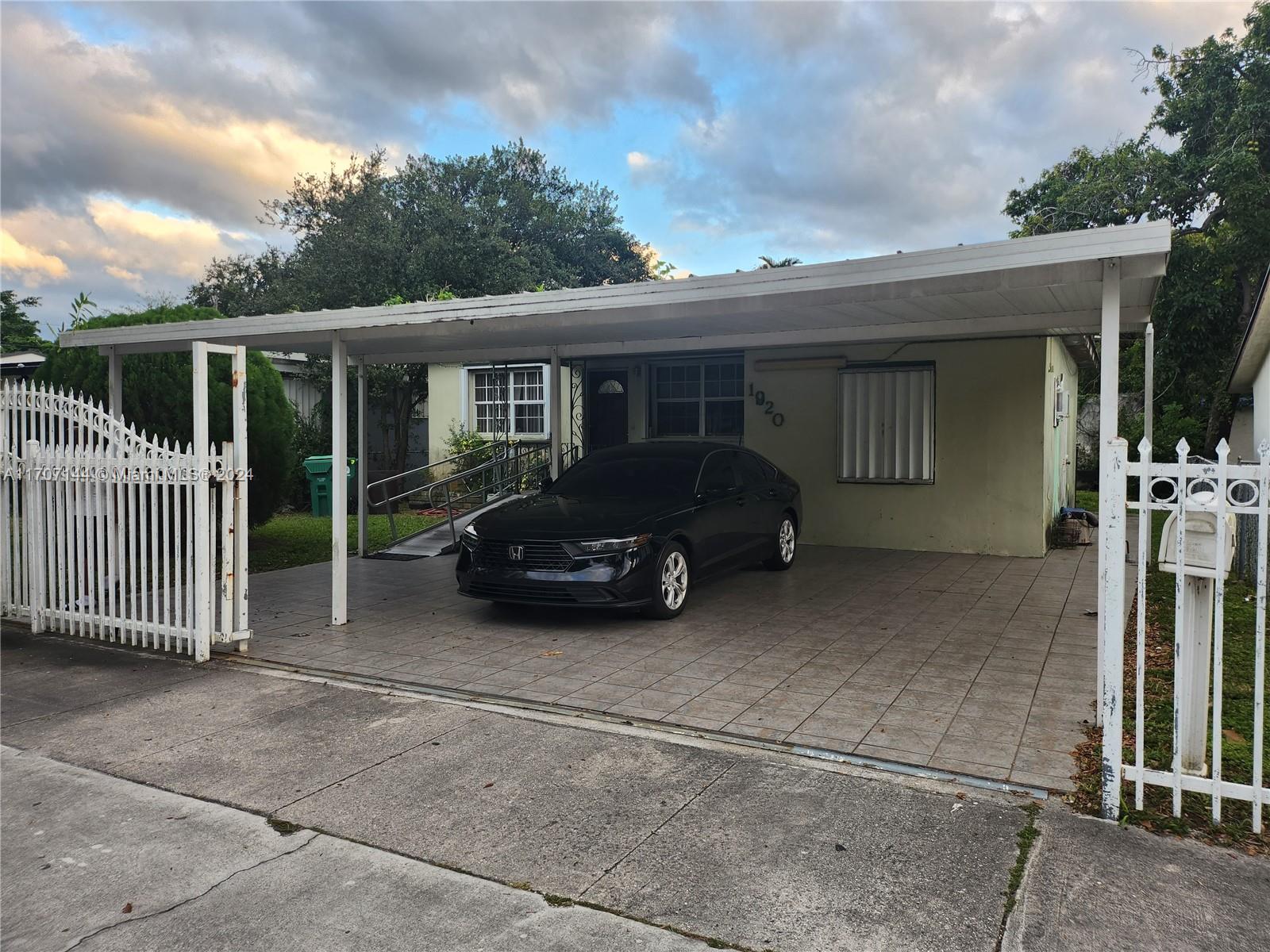 a car parked in front of house