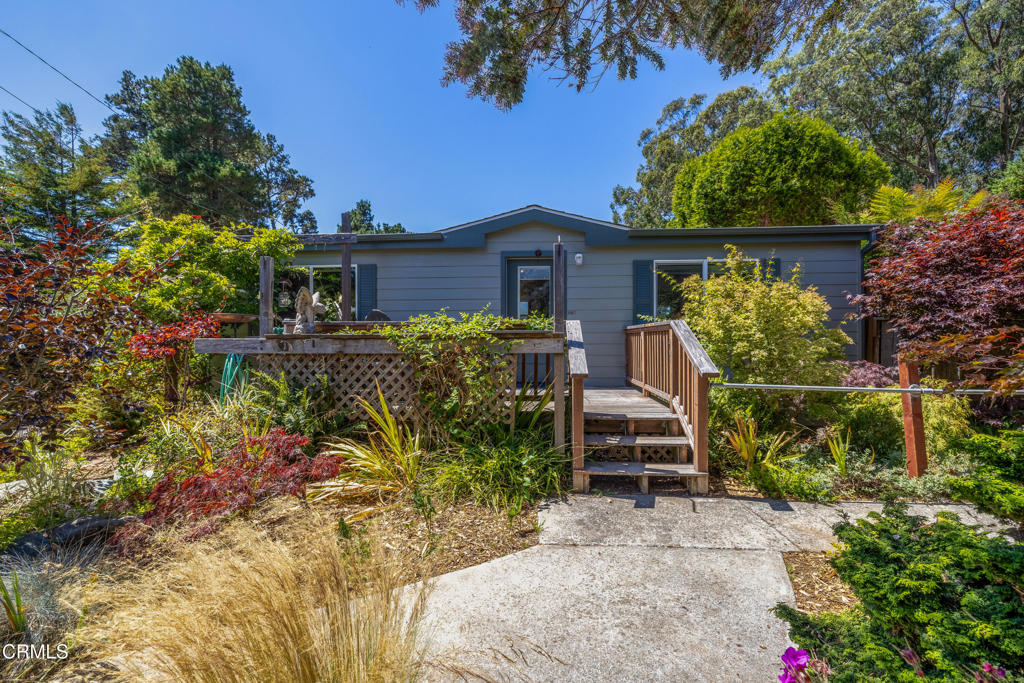 a house view with a outdoor space