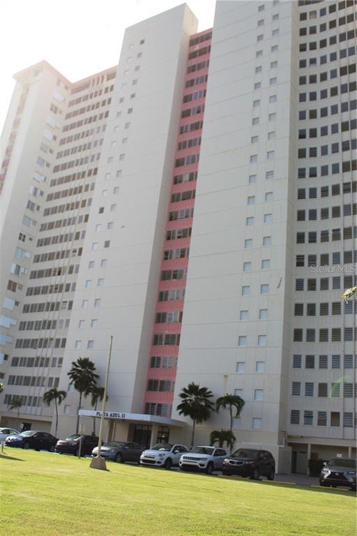 a view of a building with a swimming pool