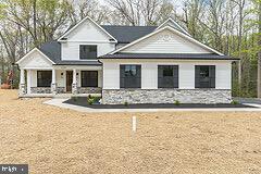 a front view of a house with yard