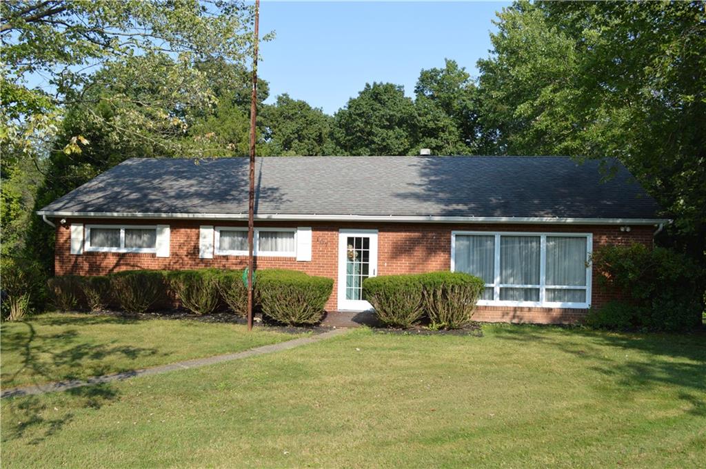 front view of house with a yard