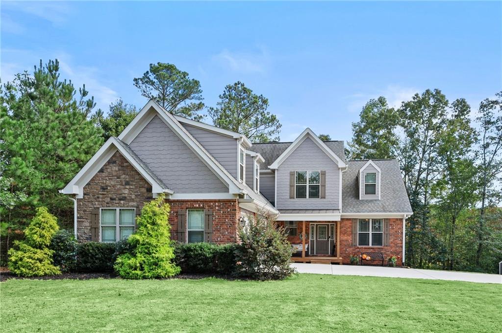 front view of a house with a yard