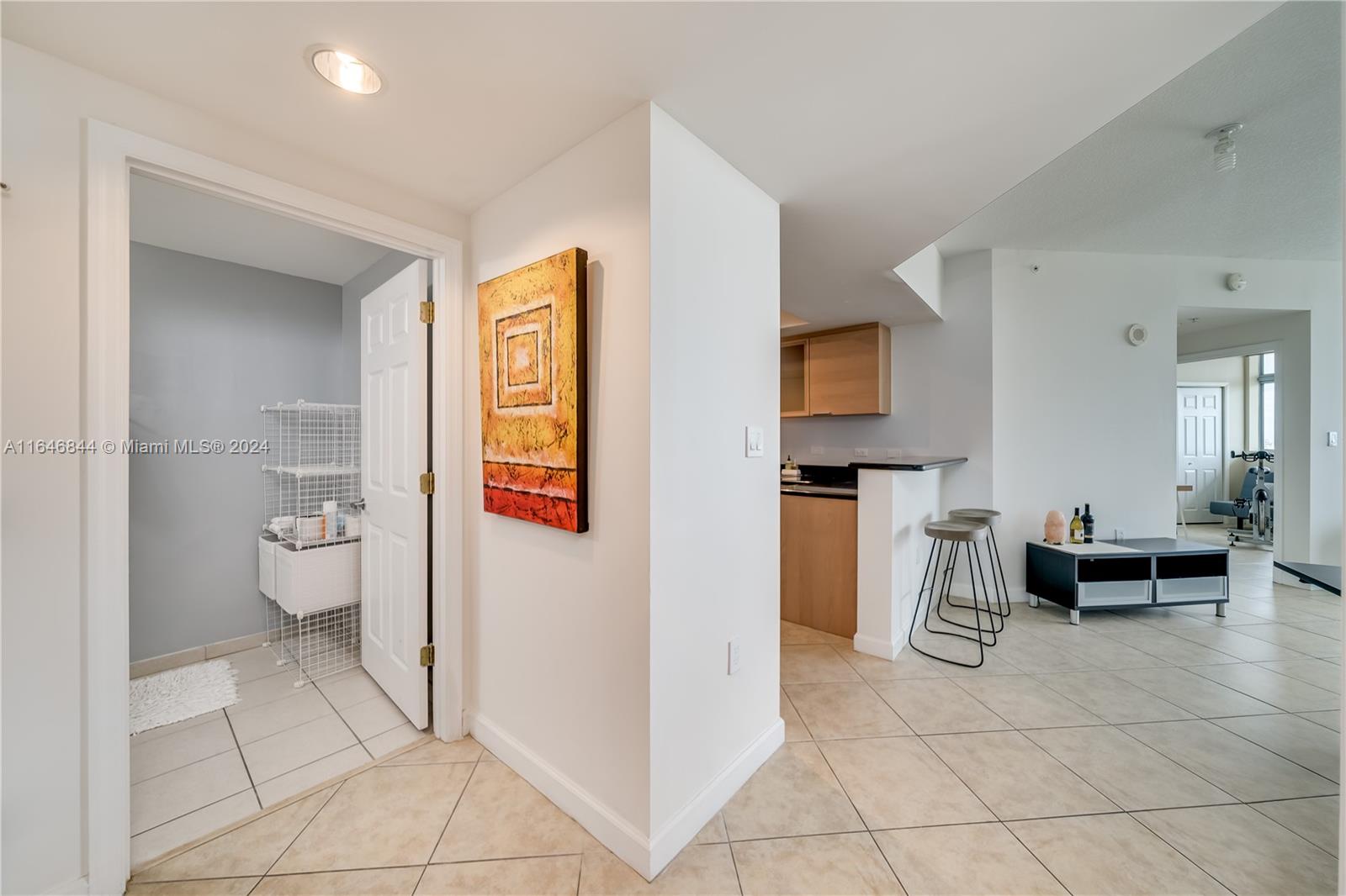 a spacious bathroom with a toilet and a shower