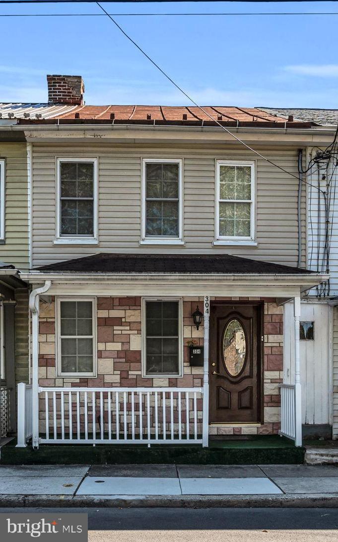 a view of a house with a balcony