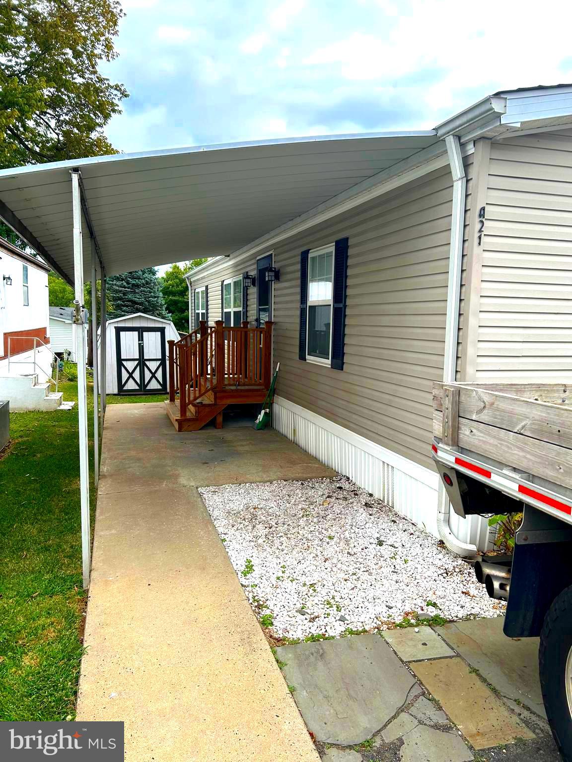 a front view of a house with a patio